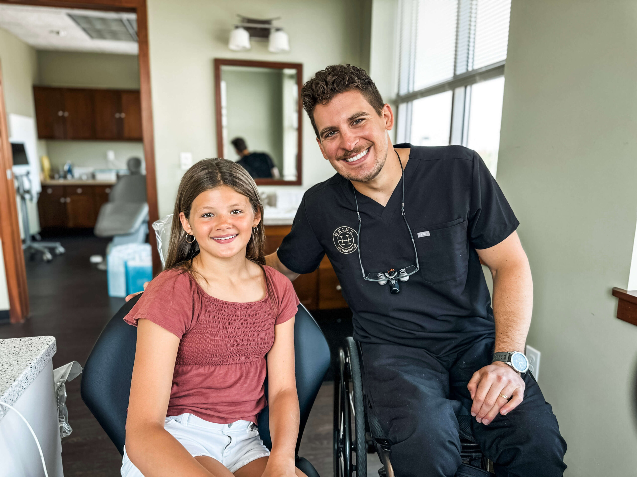 kid with braces smiling